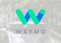 Waymo robotaxi during NHTSA investigation for school bus violations leading to software recall amid Alphabet investment in autonomous vehicle safety.