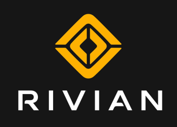 Rivian custom AI chip for autonomous driving challenges Tesla FSD in EV industry with Level 4 self-driving software subscription technology.